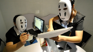 Chinese Employees Relieve Stress with Studio Ghibli Masks